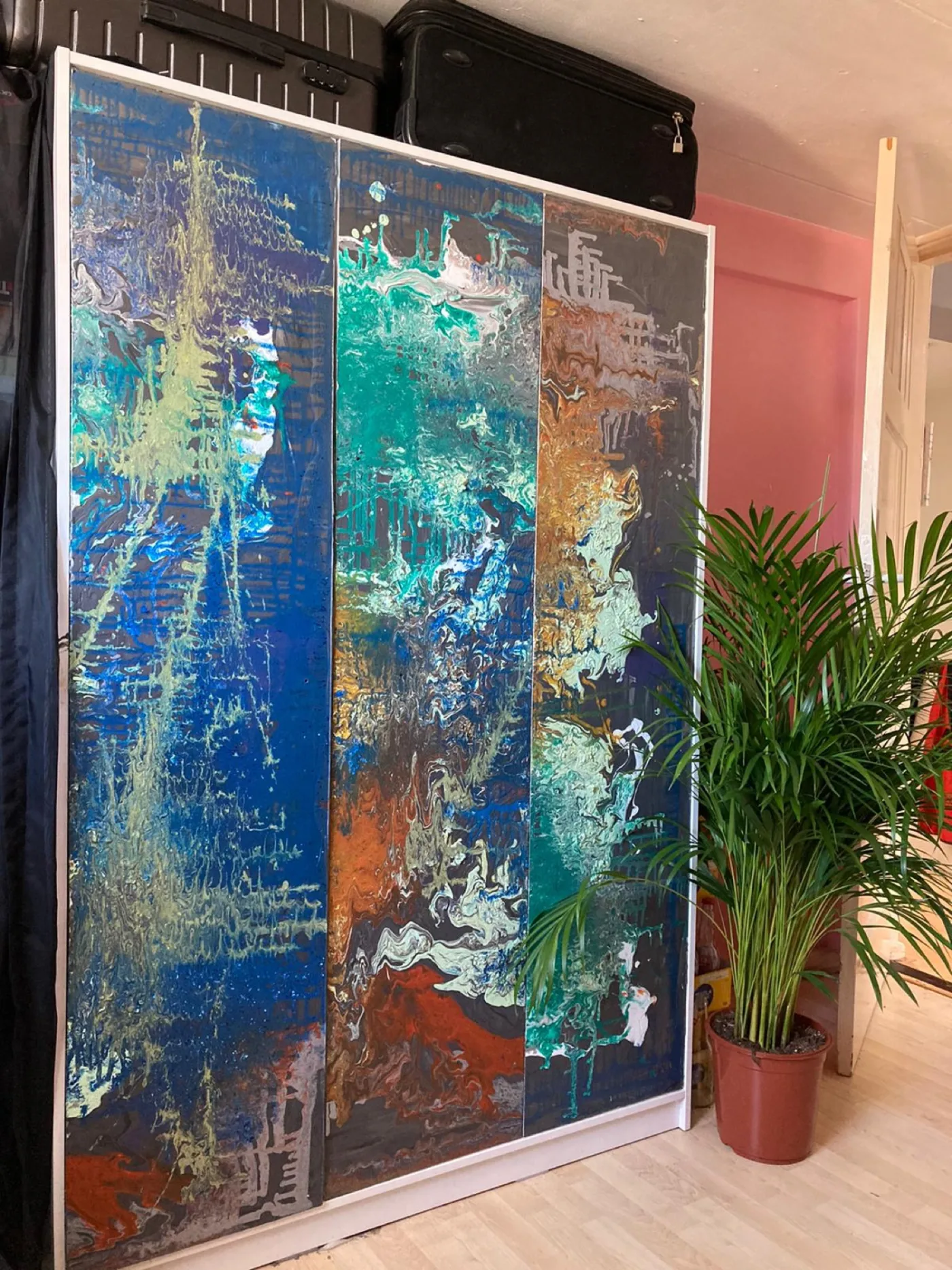 Original wARTrobe painted wardrobe installation by Danny Hirsch